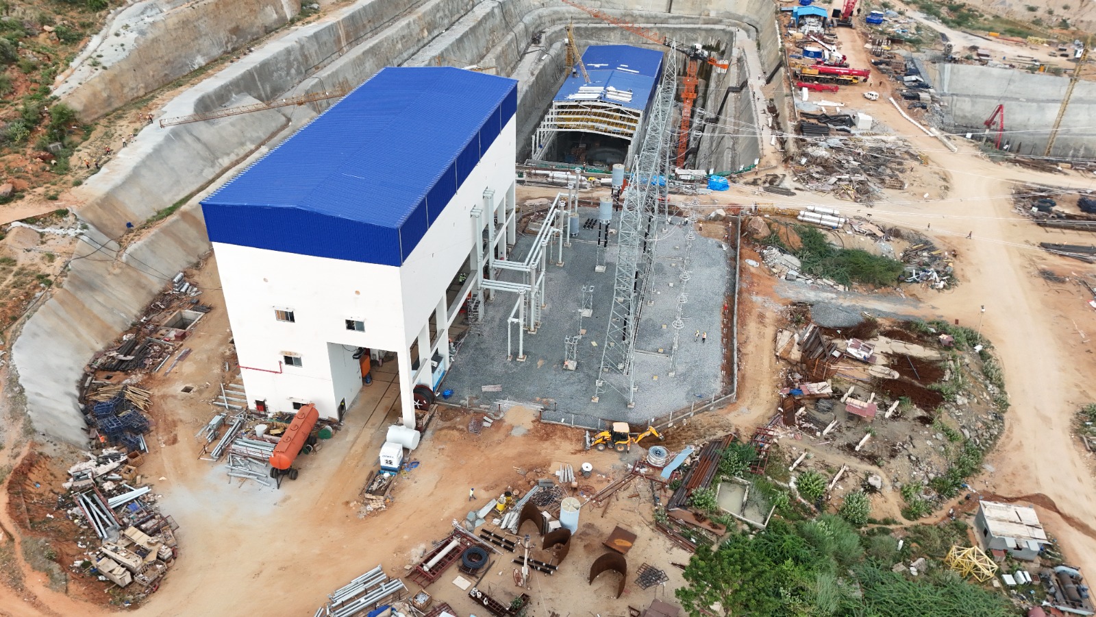 Completed switchyard and powerhouse structures at the PSP Chitravathi project